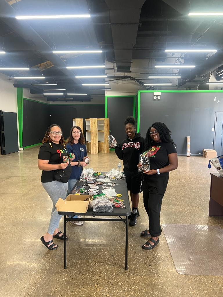 Volunteers preparing community event supplies
