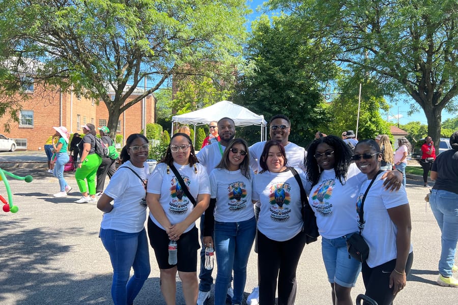 Volunteers and community members celebrating together